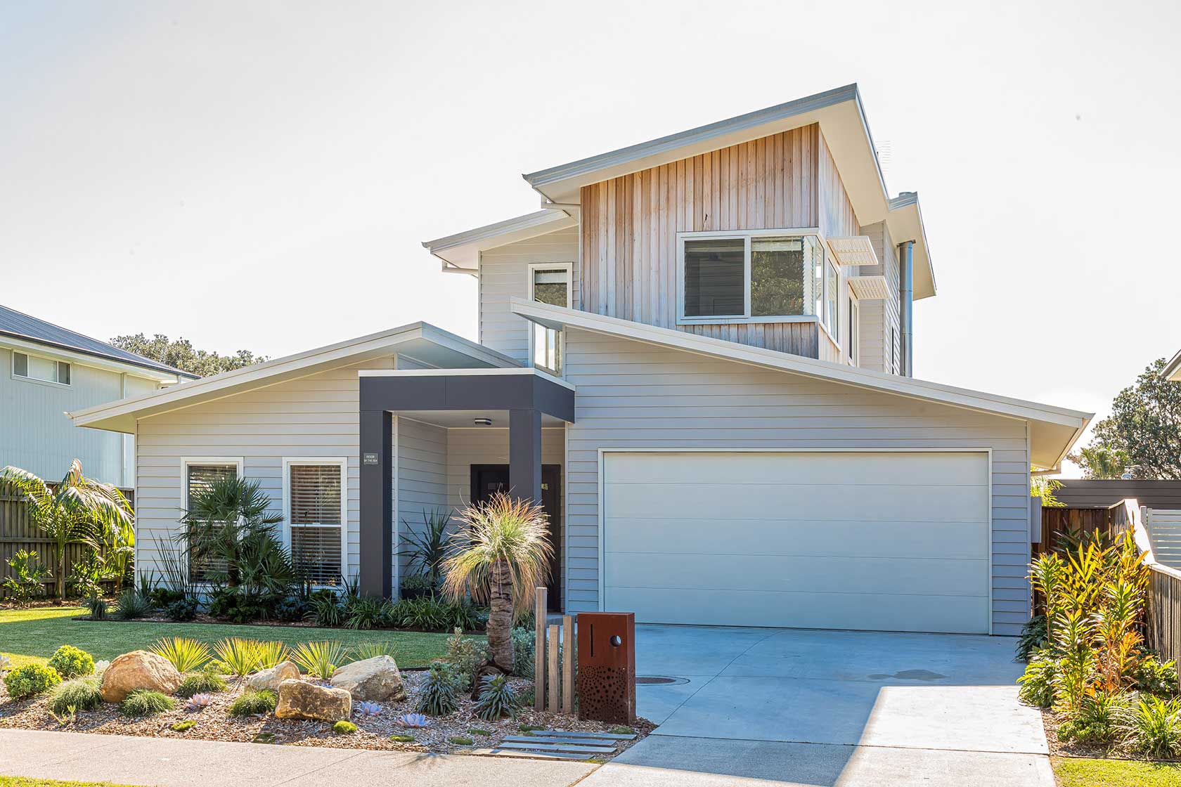 Modern two storey beach-style home with an open plan feel.